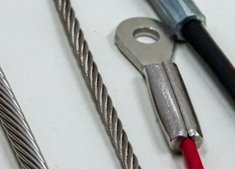 Group of cables with stamped eye end fitting.