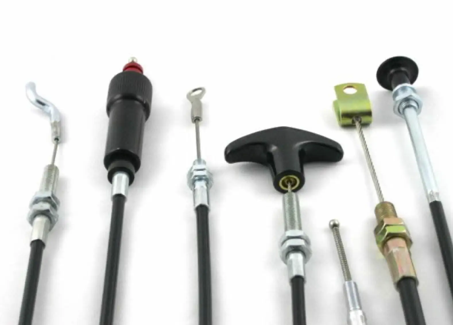 Assorted push pull controls on white background.