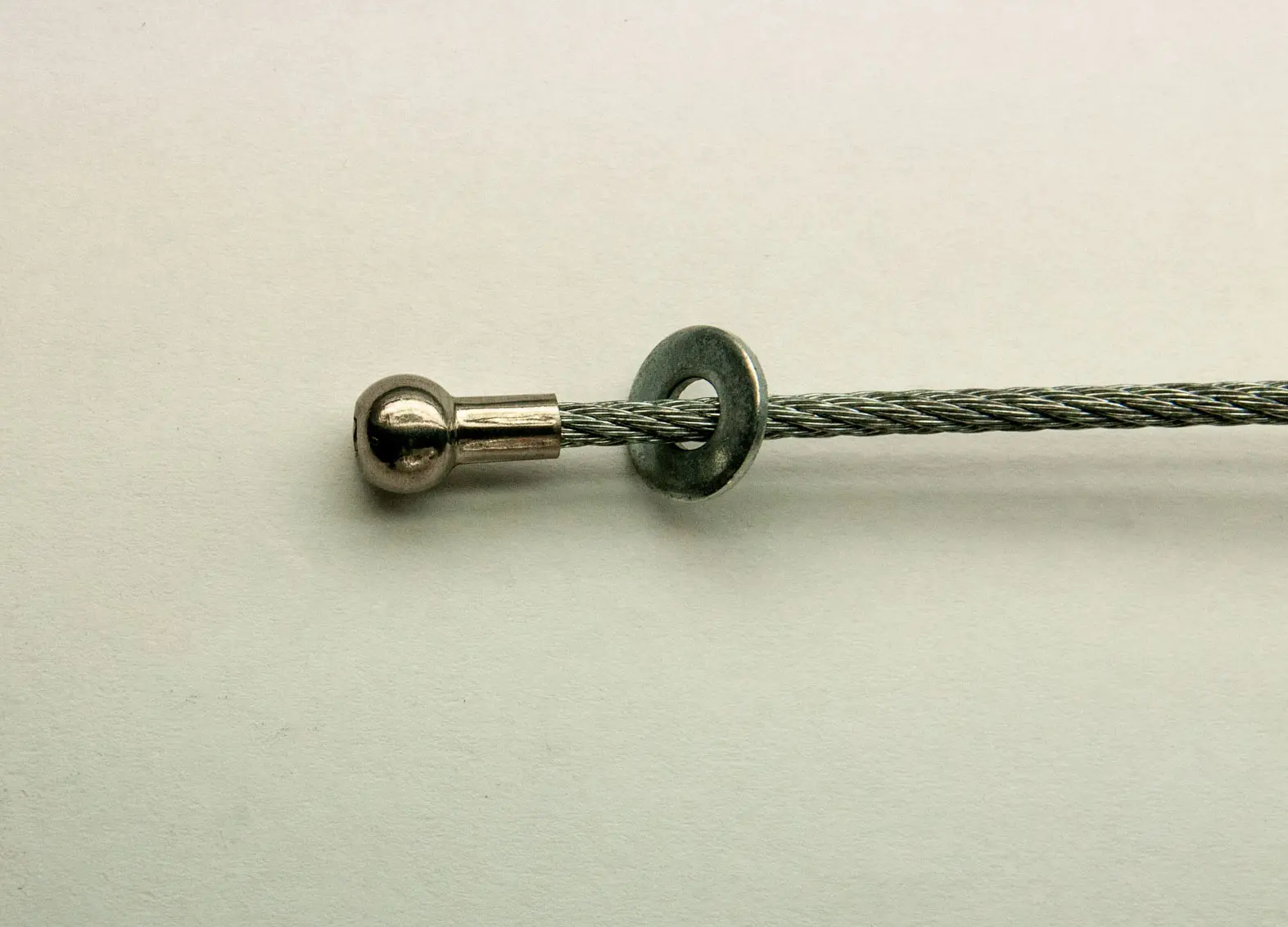 Ballshank end fitting and washer on white background