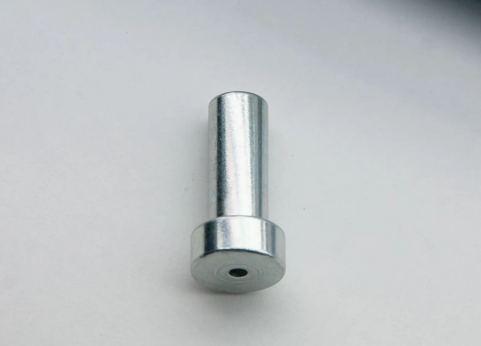 Single Stop end fitting on white background