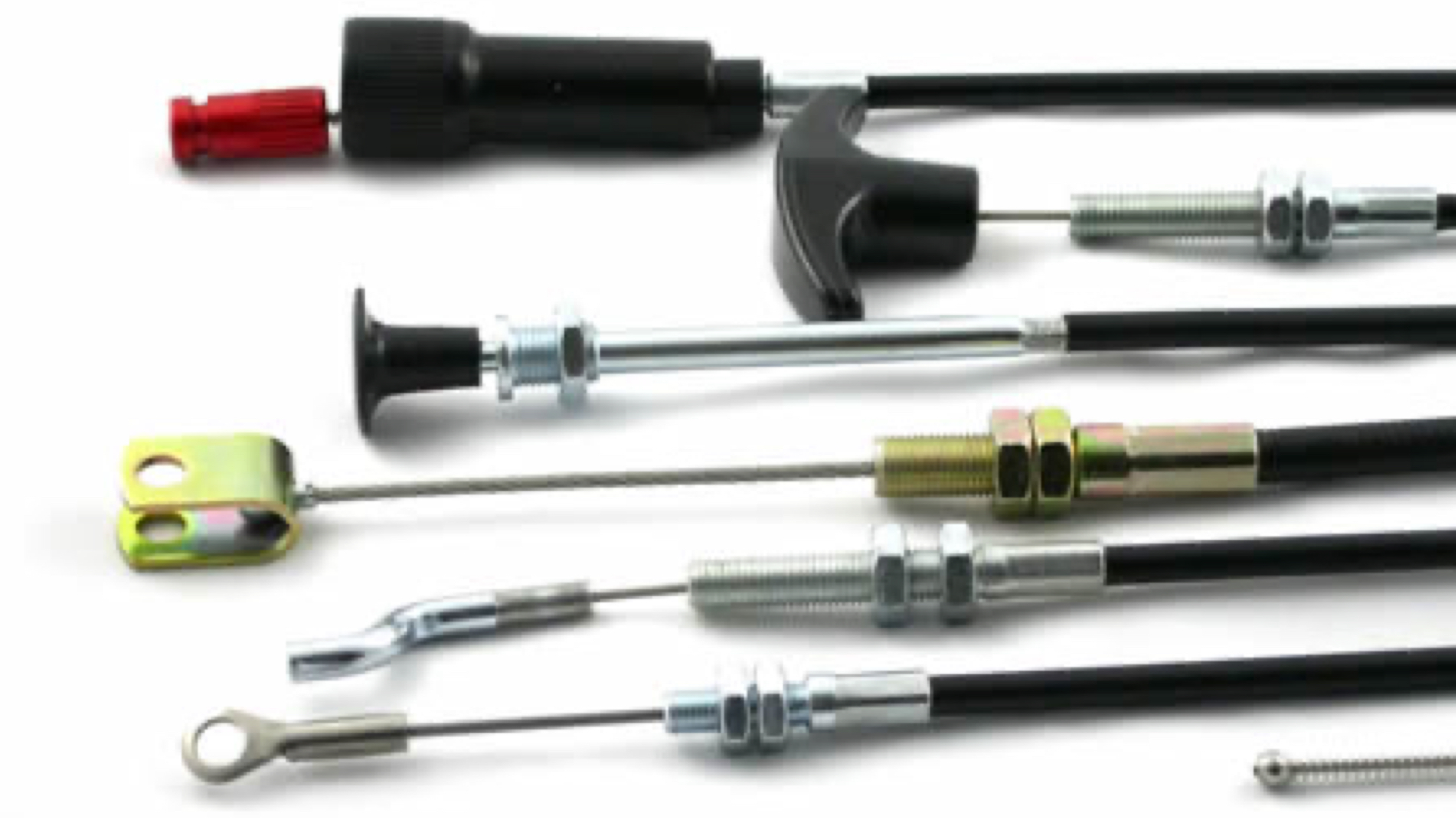 Assorted cables with different end fittings lined up on a white background.