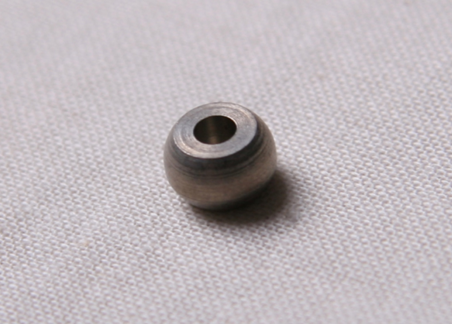 Close-up of ball end fitting.