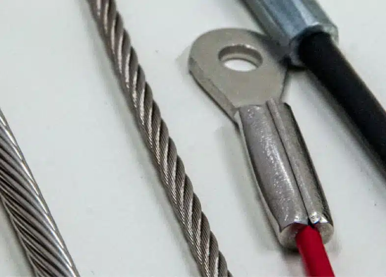 Group of cables with stamped eye end fitting.