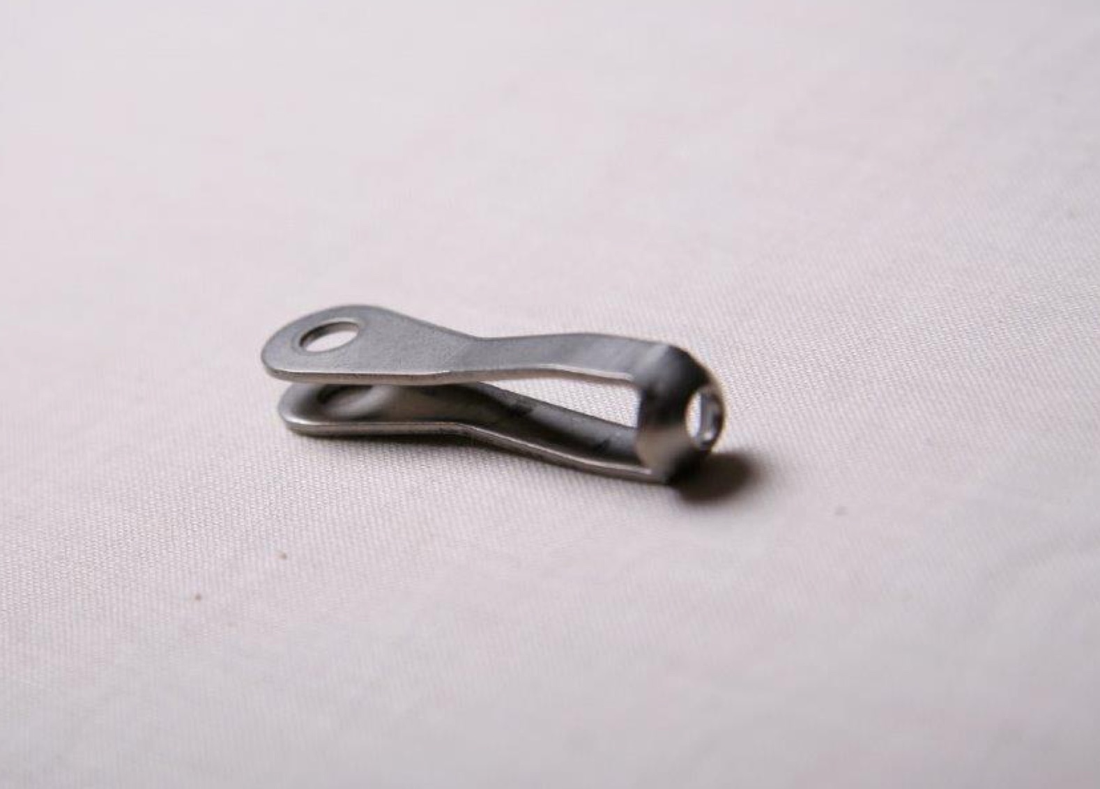 Close-up of strap fork eye.