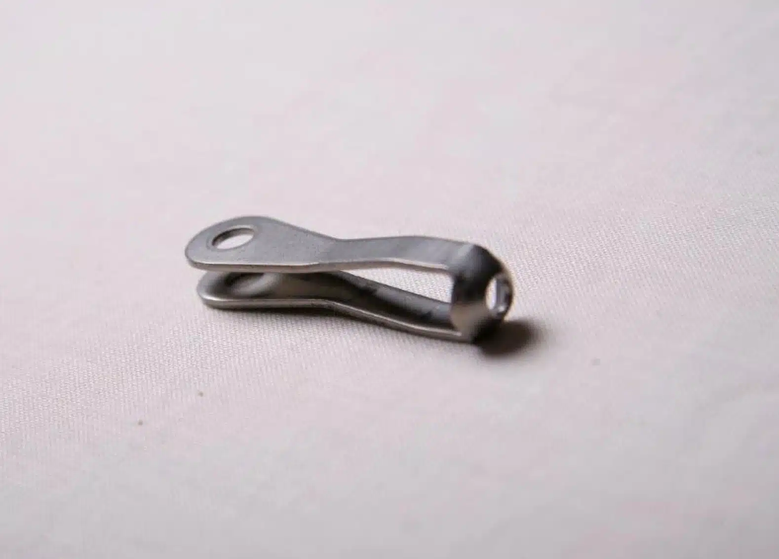 Close-up of strap fork eye.
