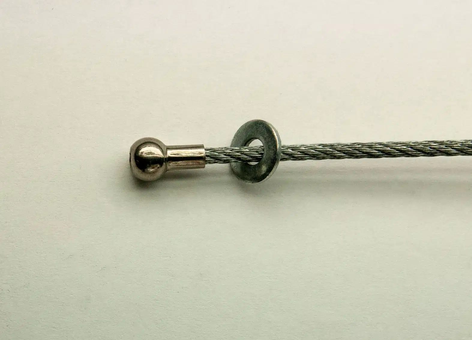 Ballshank end fitting and washer on white background