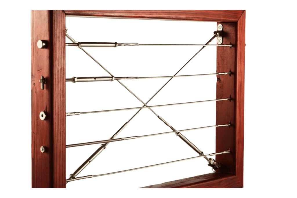Cable railing section with metal cables tensioned across a wooden frame.