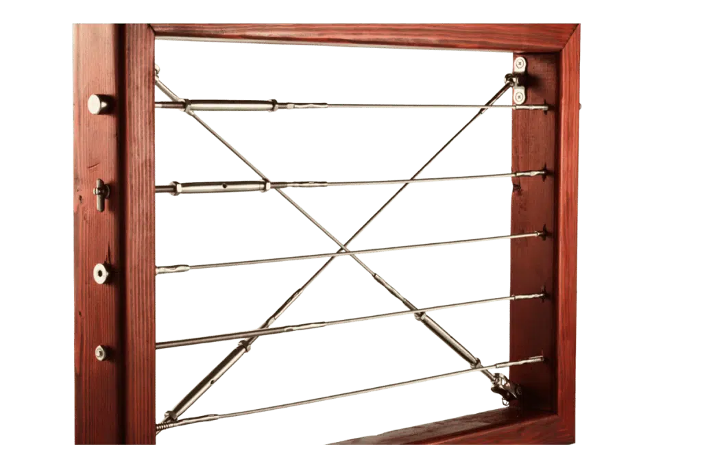 Cable railing section with metal cables tensioned across a wooden frame.